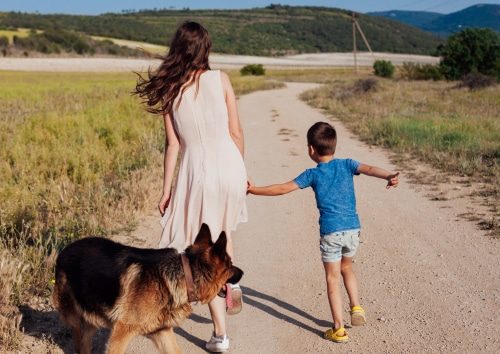 protection dog with a woman and a child